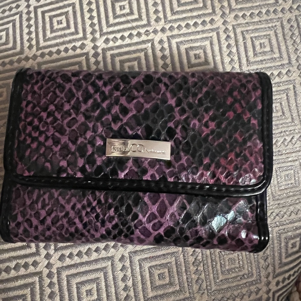 Nine by Nine West plum colored animal print wallet